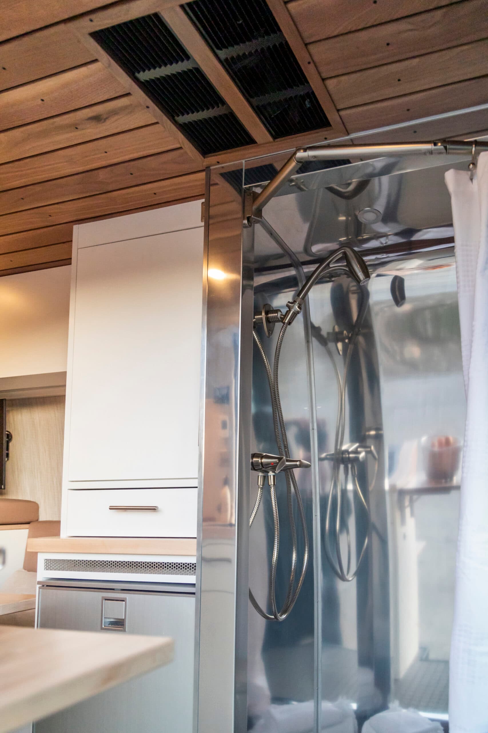Hidden shower install in a camper van