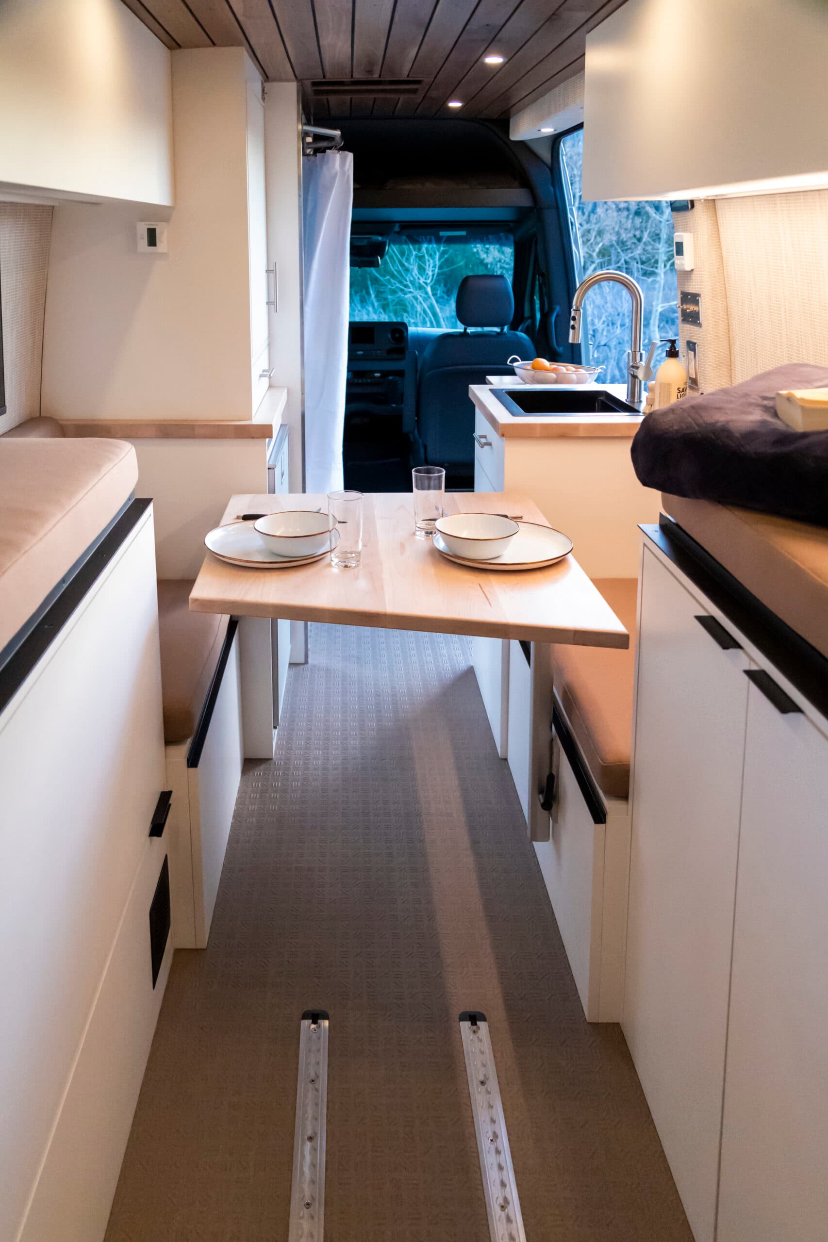 Wide view of a finished camper van interior