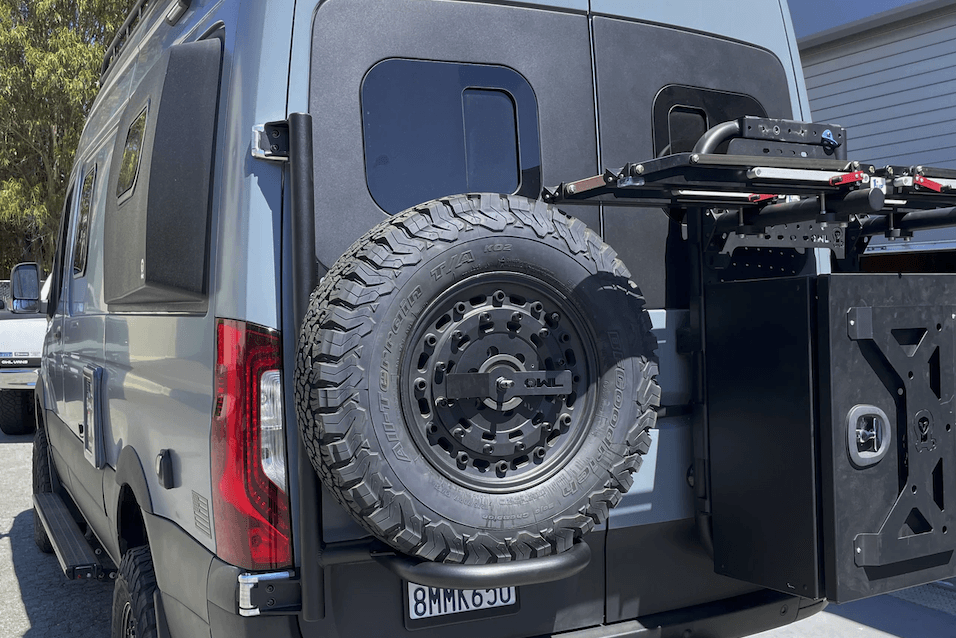 Rear tire carrier and storage box on a Sprinter