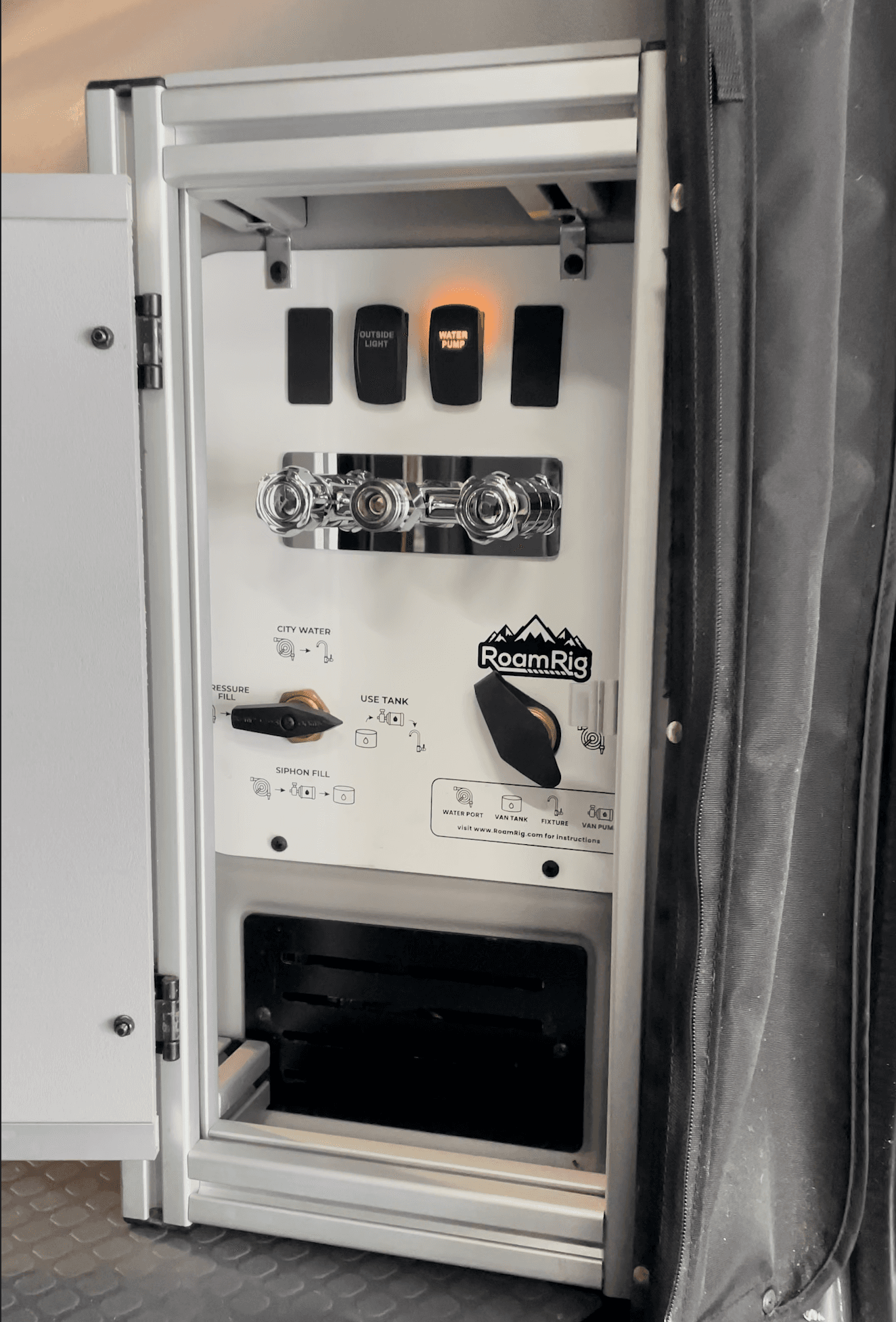 RoamRig plumbing upgrade installed in a Winnebago Revel