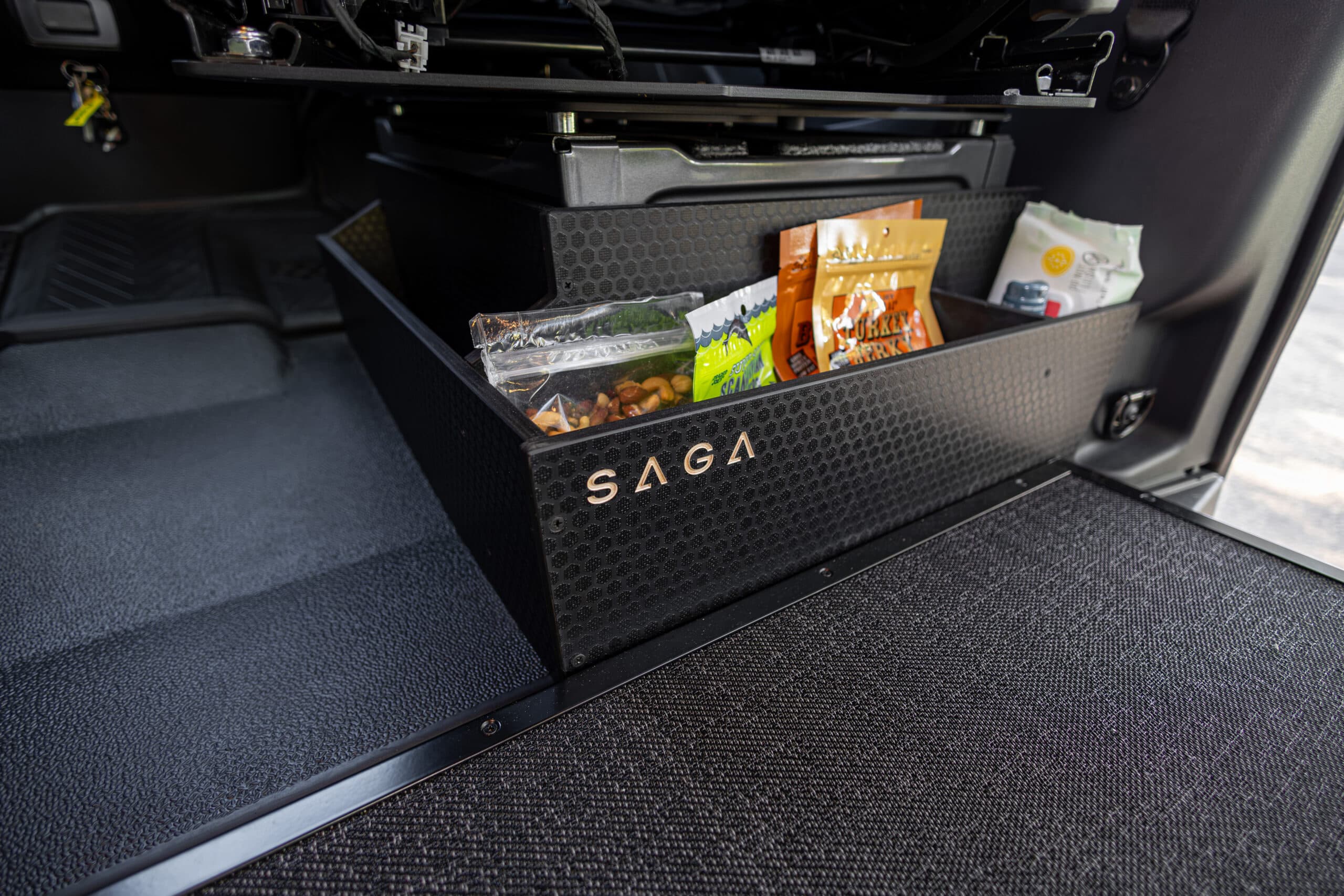 SAGA Terrapin Wedge storage installed between van seats