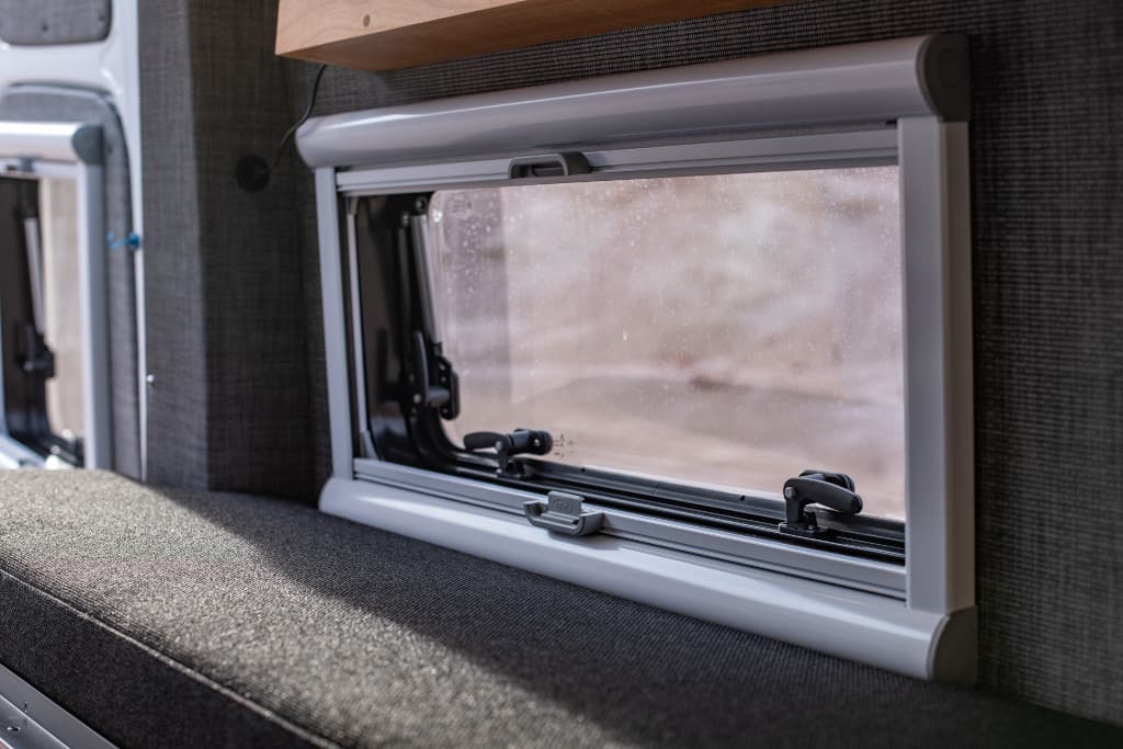 Sprinter camper interior with custom cabinetry