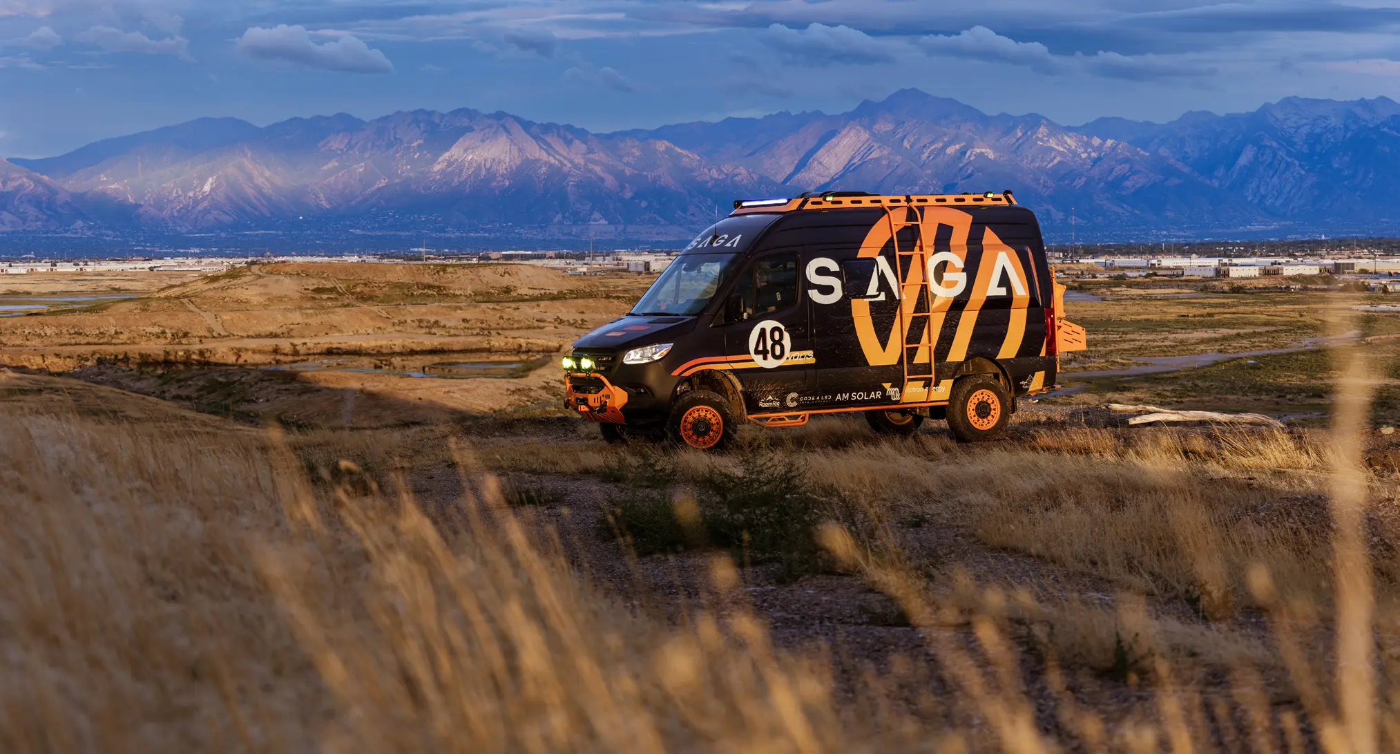 SAGA Van — black and orange truck with SAGA branding